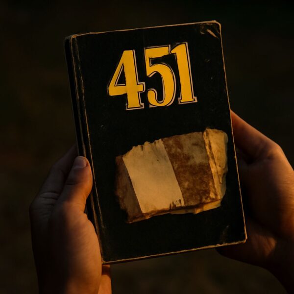 Fahrenheit 451 book cover showing flames and burning pages