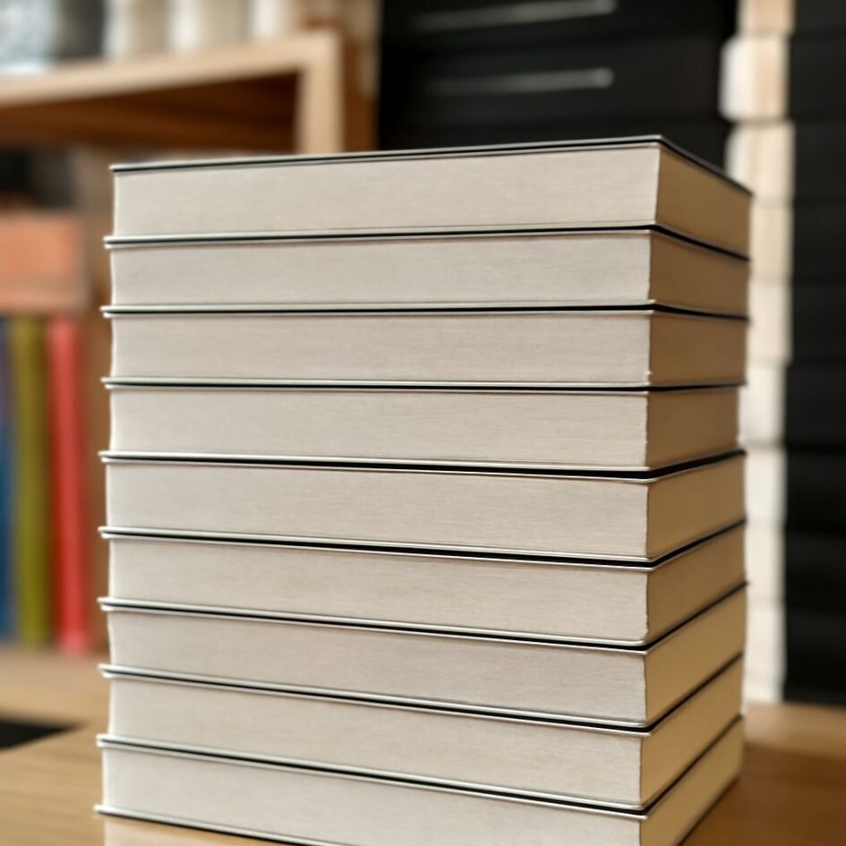 'Of Mice and Men' book cover with banned stamp